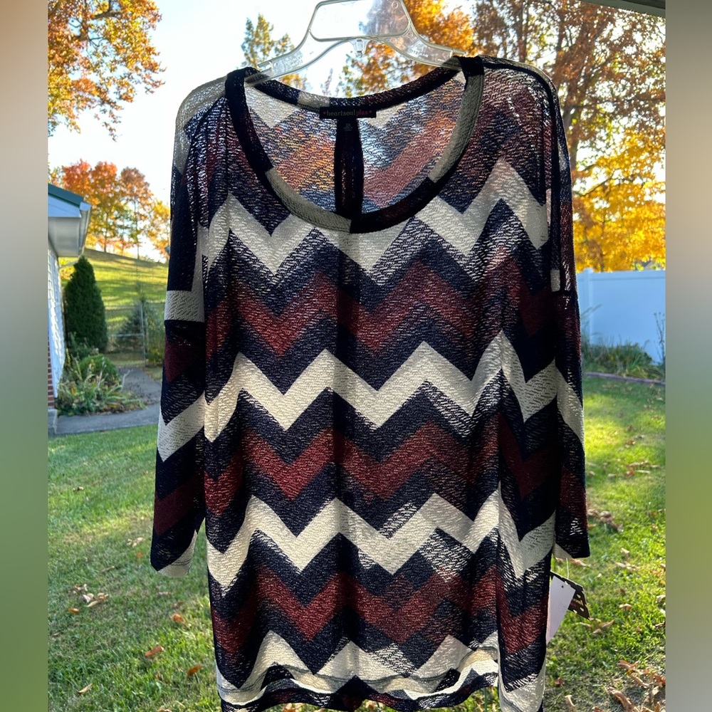 NWT top is Boho like / netted like lightweight, comfortable material stylish